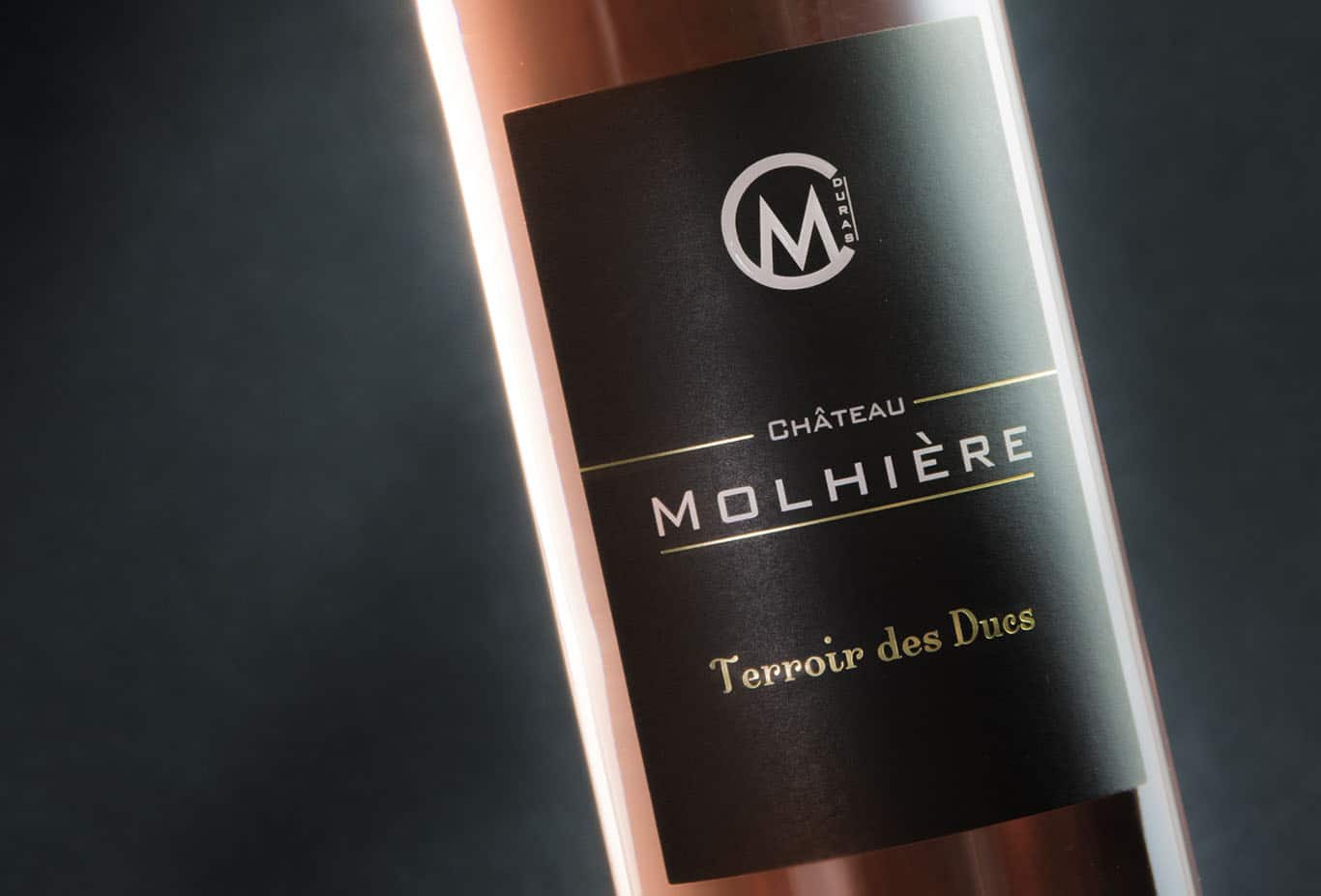 A bottle of Château Molhière Terroir des Ducs rosé